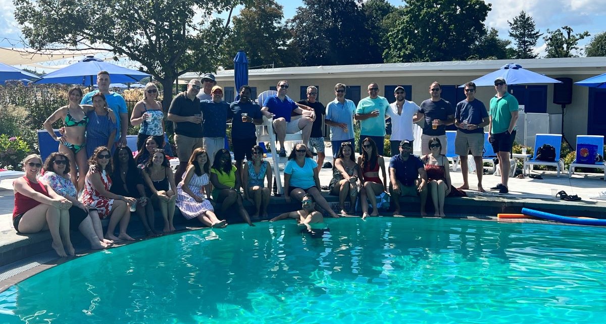 2023 Summer Outing group shot by the pool